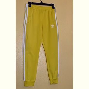 Yellow Adidas track pants
